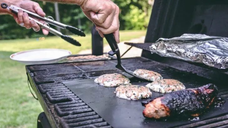 man grills using grill mats