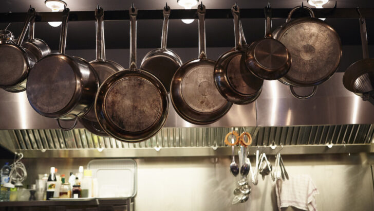 Wok hanging in commercial kitchen