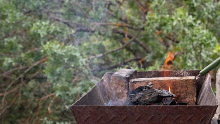 place your firewood into your grill